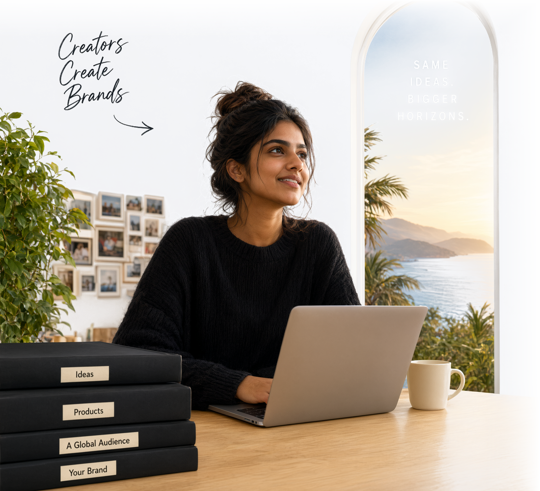 A creator at her desk looking toward a horizon, beside books labelled Ideas, Products, A Global Audience and Your Brand
